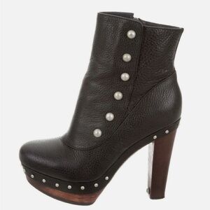 UGG Cosima Black Leather Platforms.